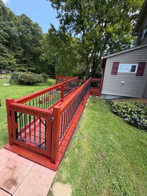 Corner of a painted ramp and railing