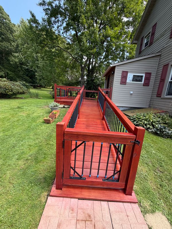 Painted access ramp and red handrails