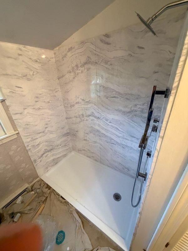 Finished shower wall panels and corner joints